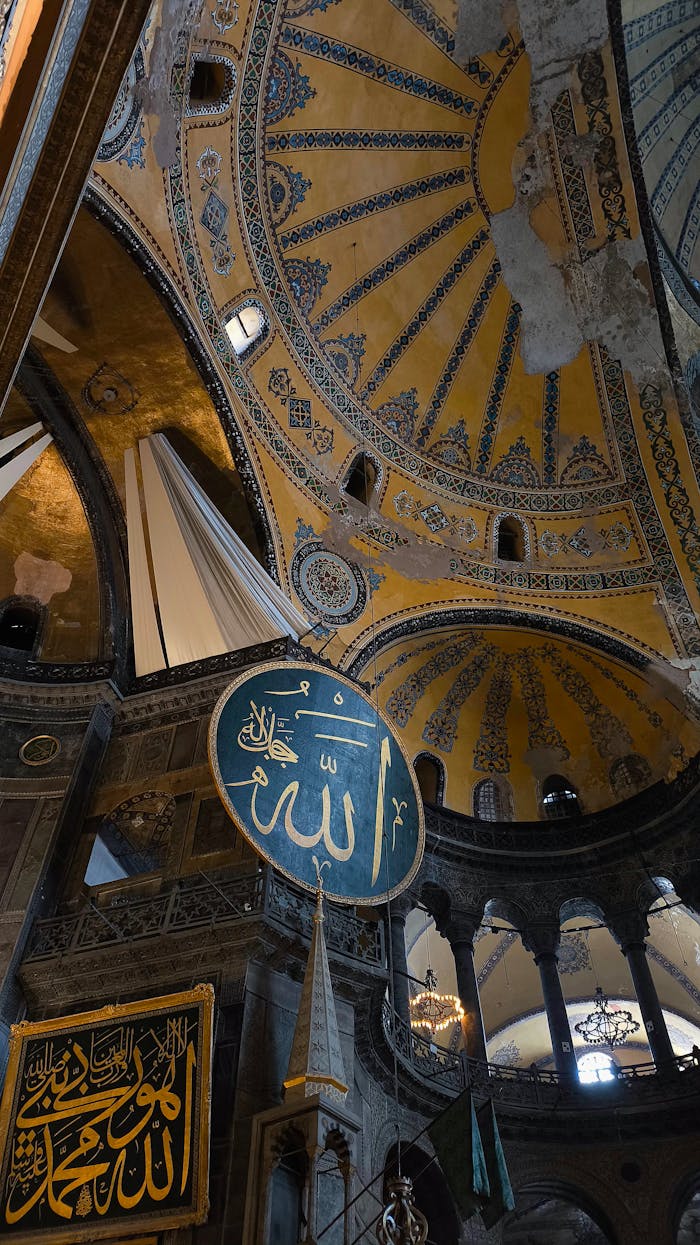 Intricate details of Hagia Sophia's iconic dome in İstanbul showcase historical architectural artistry.